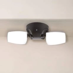 Variable CCT 2000 Lumens Twin Head Bronze Outdoor Integrated LED Floodlight with Integrated Photocontrol by Commercial Electric -OCTO LIGHTS Shop bronze commercial electric flood lights ft28vcibce 4f 1000