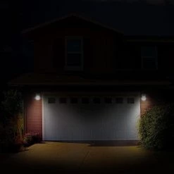 Commercial 100-Watt Equivalent Integrated LED Bronze Outdoor Wall Pack Over Door Light, 1500 Lumens by Commercial Electric 12 Commercial 100-Watt Equivalent Integrated LED Bronze Outdoor Wall Pack Over Door Light, 1500 Lumens by Commercial Electric -OCTO LIGHTS Shop bronze commercial electric wall pack lights prwx15 v pc 4k bz 77 1000